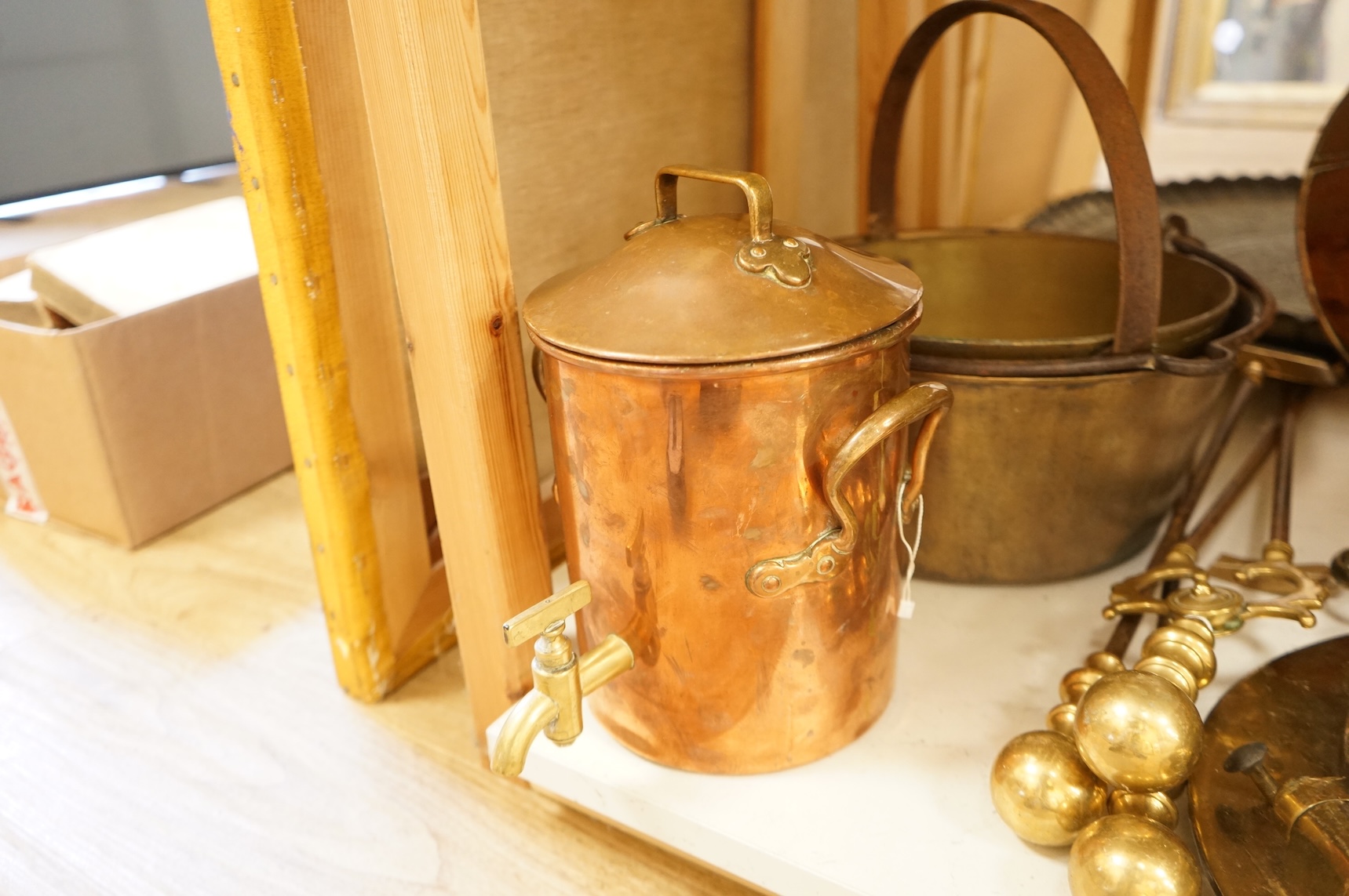 Assorted Victorian and later copper and brassware including two ships portholes, copper kettle pots, etc (16). Large porthole 36cm diameter